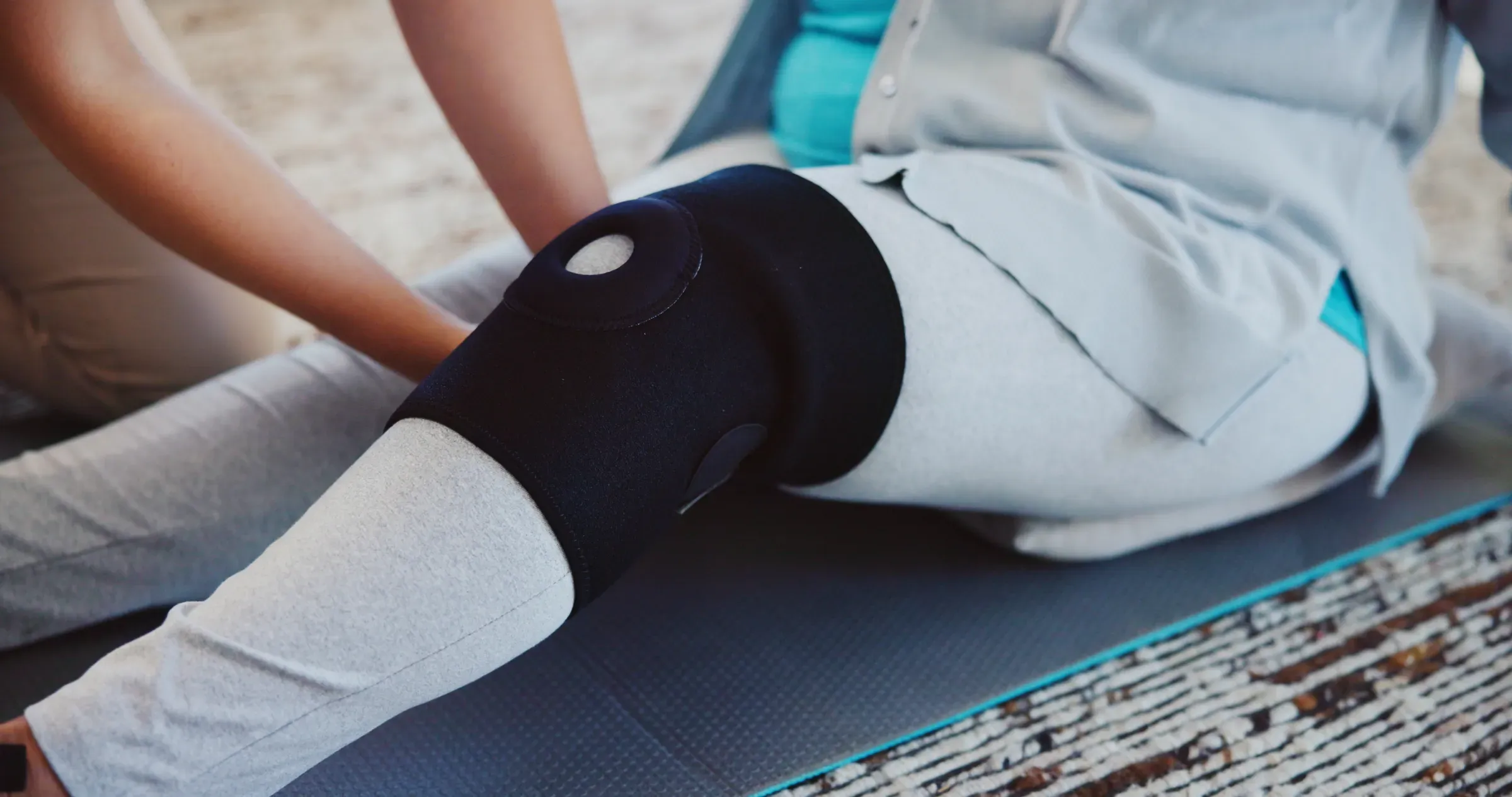 Knee brace, hurt and physiotherapist with patient, rehabilitation and support for joint and healthcare., compression & orthopedic supports ecommerce