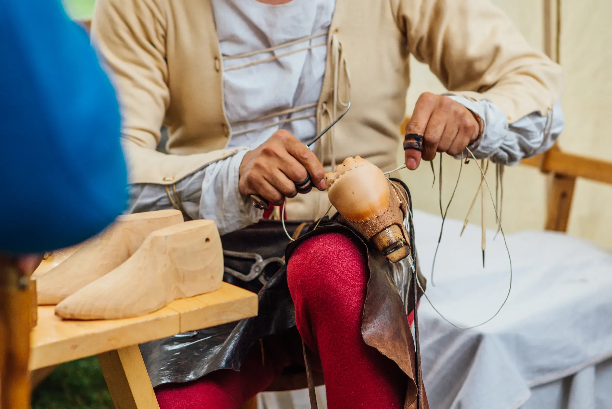 Medieval Shoemaker Crafting Leather Shoe By Hand Traditional Historical Reenactment Artisan Leatherwork, custom & made-to-order shoes ecommerce