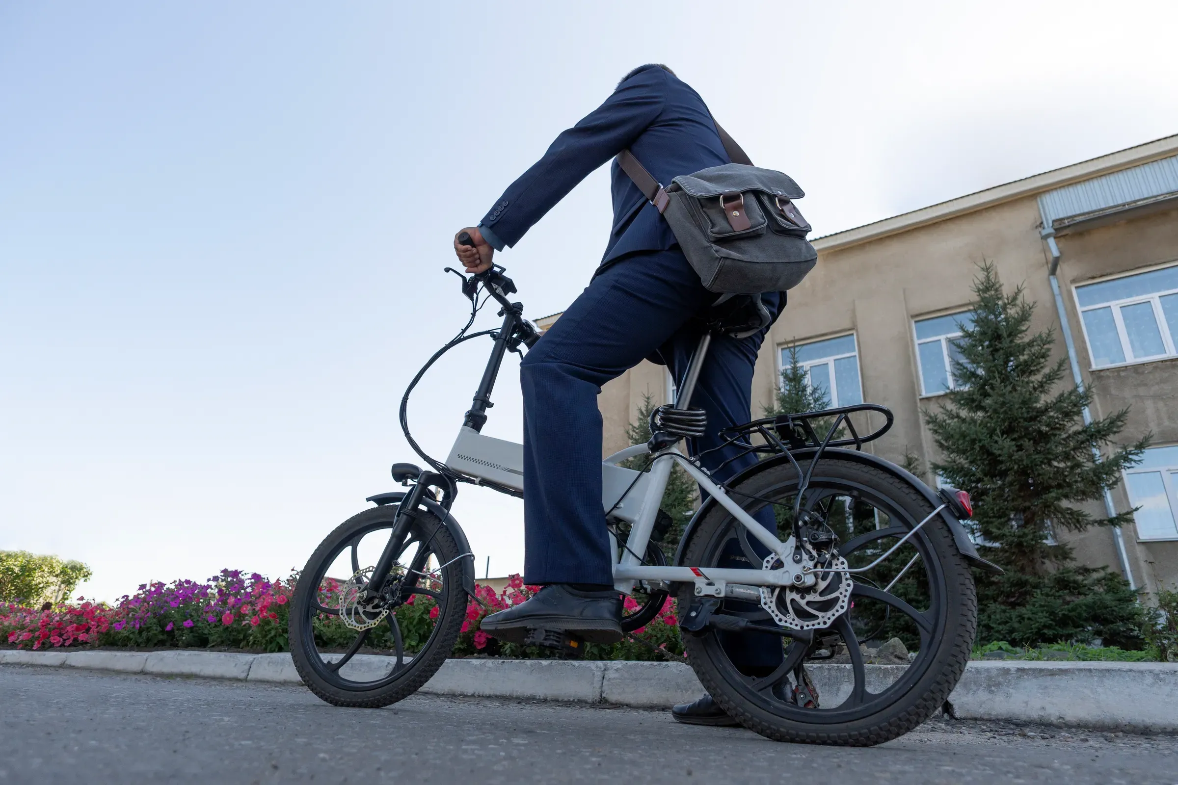 A new modern alternative mode of transport. Eco-friendly electric bike. Hipster businessman commuter with, e-bikes ecommerce