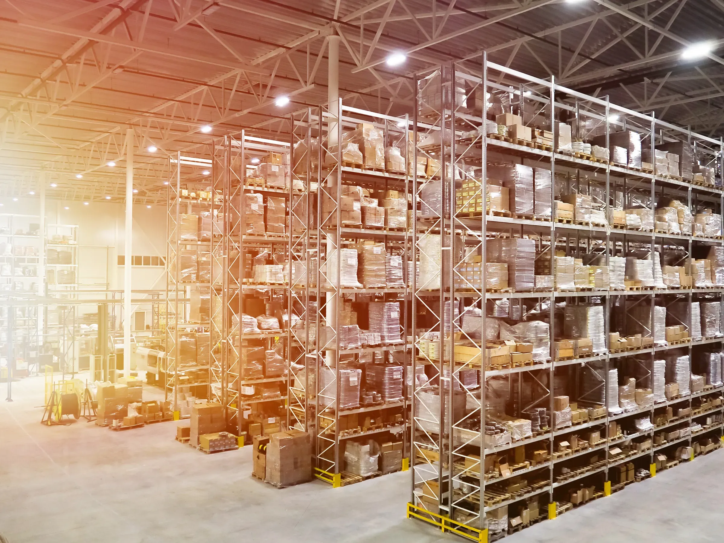 Large modern blurred warehouse industrial and logistics companies. Warehousing on the floor and called the, industrial & b2b ecommerce