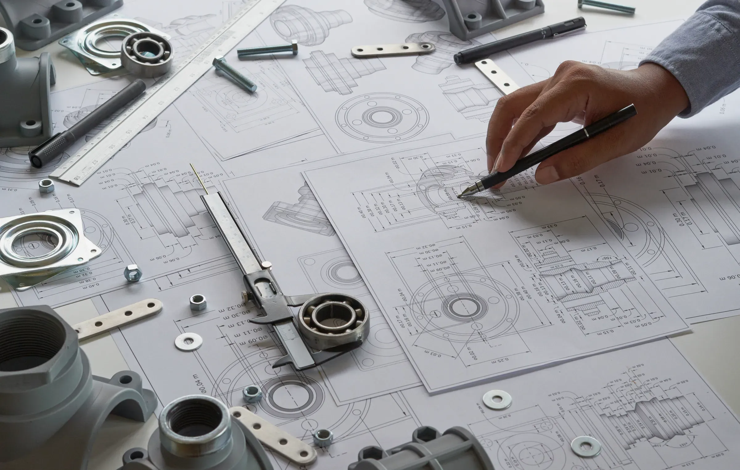 Engineer technician designing drawings mechanicalÂ parts engineering Enginemanufacturing factory Industry, industrial parts & bearings ecommerce
