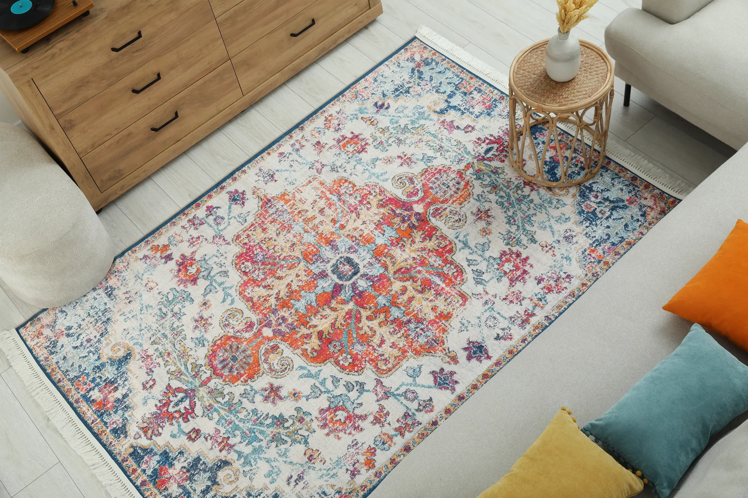 Stylish living room with beautiful carpet and furniture, above view. Interior design, rugs ecommerce