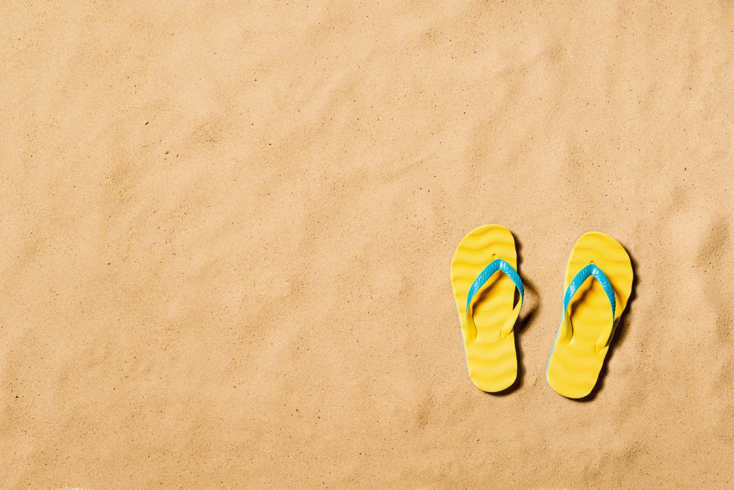 Summer vacation background with a pair of flip flop sandals, sandals ecommerce