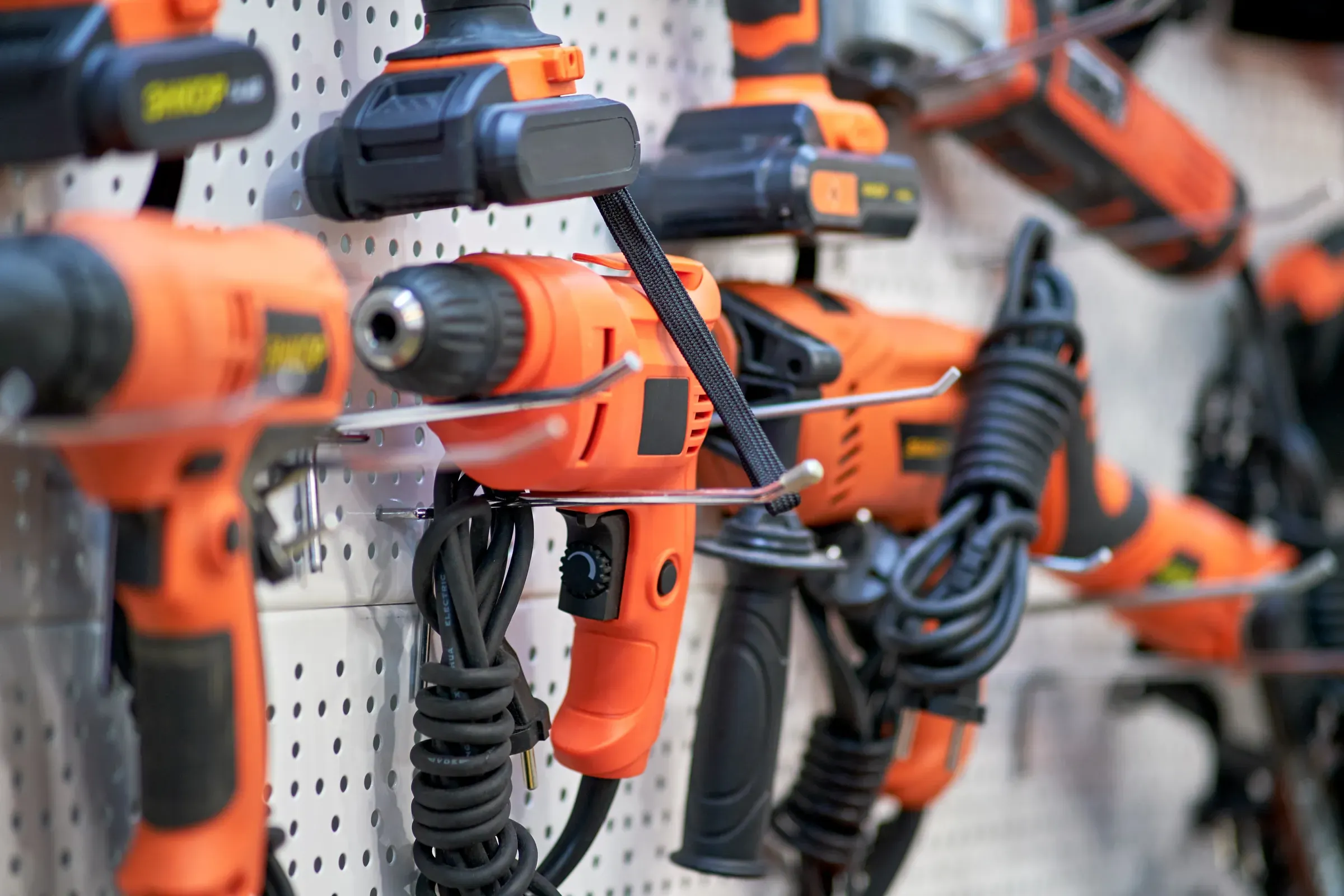 A professional tool for work, repair and construction in the store. Sale of wired power tools and battery, tools & hardware ecommerce