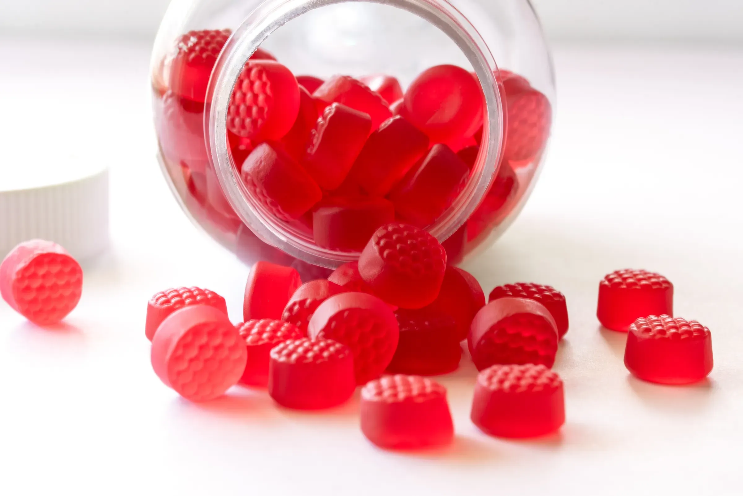 Vitamin B12 Chewable Gummies Spilled from a Bottle, vitamins & multivitamins ecommerce
