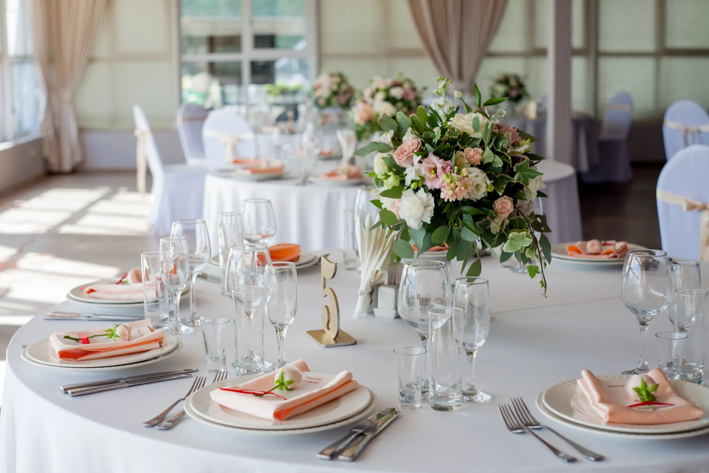 Wedding decor. Flowers in the restaurant, table setting, wedding favours & decor ecommerce