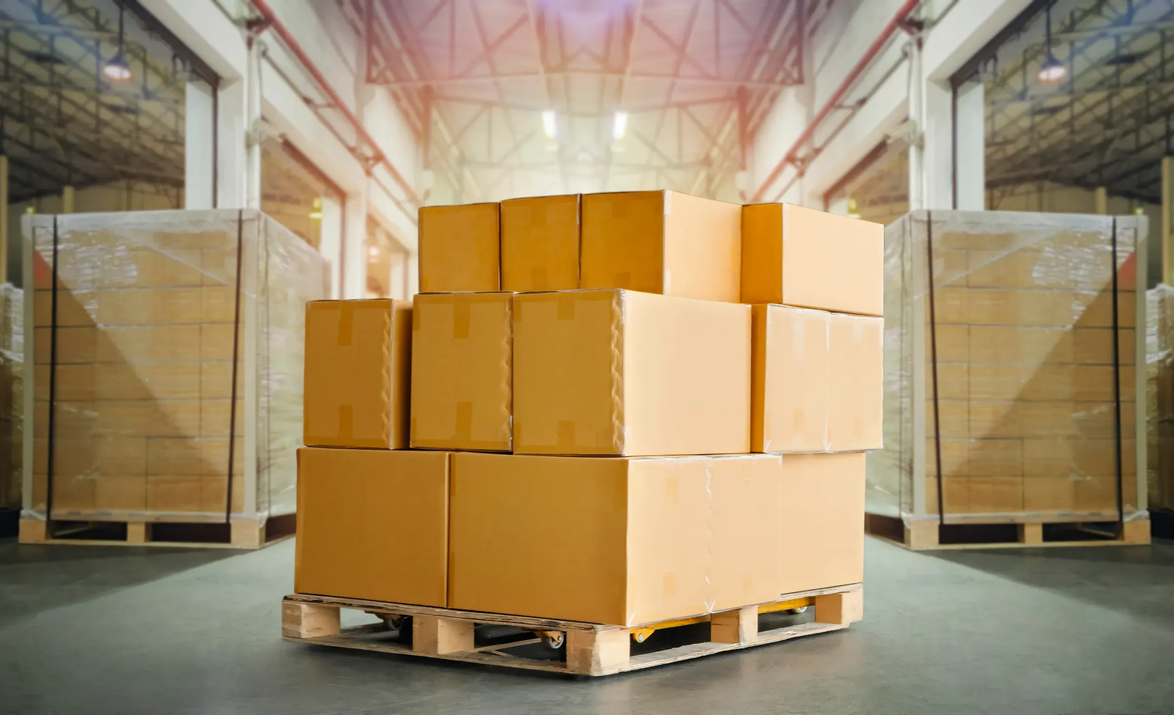 Packaging Boxes Stacked on Pallets in Storage Warehouse. Cartons Cardboard Boxes. Supply Chain. Storehouse, wholesale & b2b stores ecommerce
