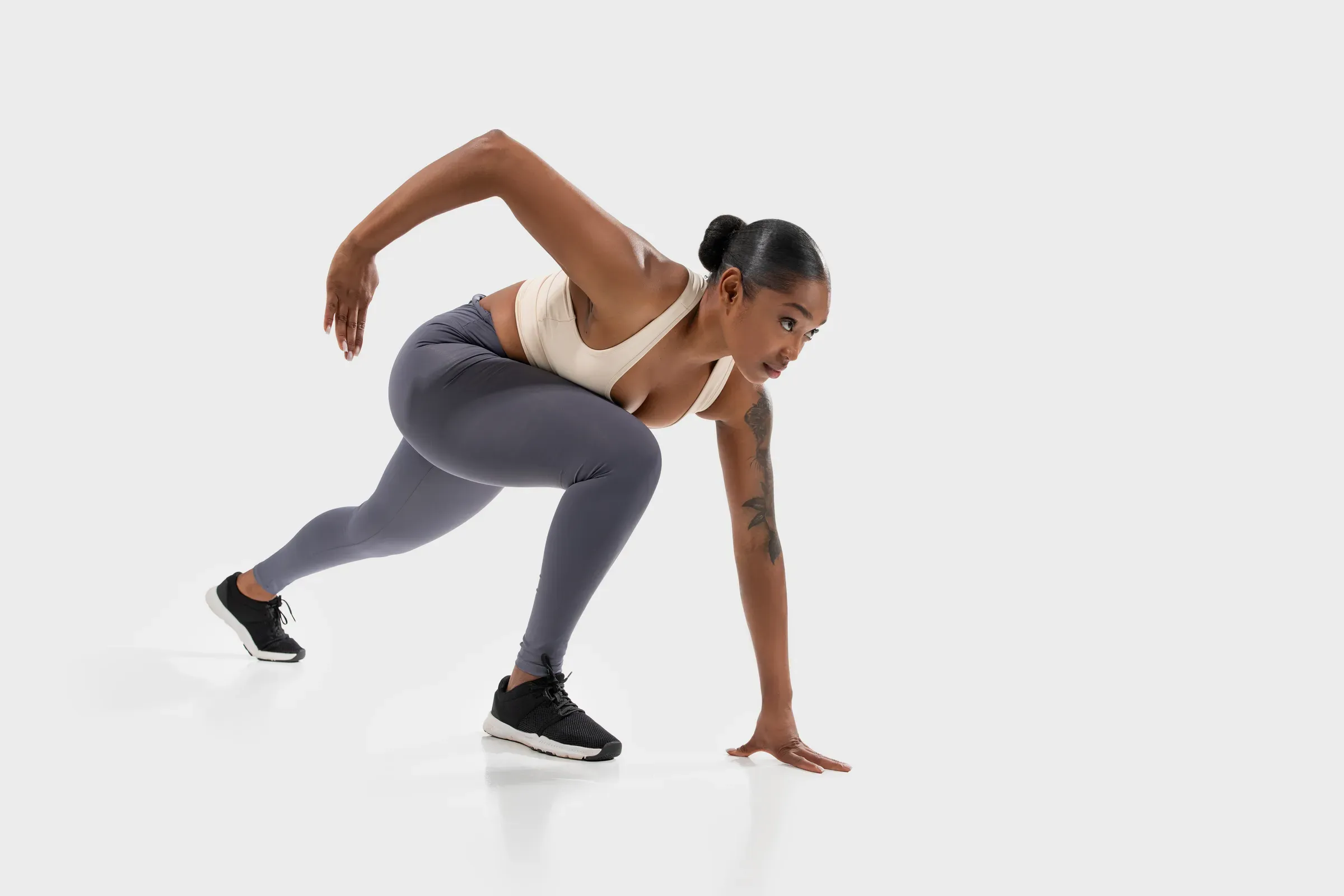 Woman in Gray Leggings and Sports Bra in Starting Position, women's activewear ecommerce